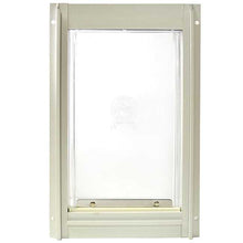 A pet door with a clear flap and a light-colored frame.