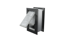 Angled view of an open, black Endura Flap double flap wall mount pet door. This through wall dog door is perfect for keeping out the elements.