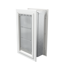 Angled view of a closed, white Endura Flap double flap wall mount pet door. This insulated dog door for wall helps maintain your home's temperature.