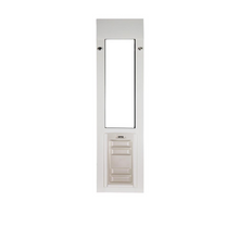 A white sliding glass door pet door insert.