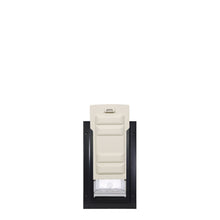 Pet door with a black frame and a closed, light-beige flap.