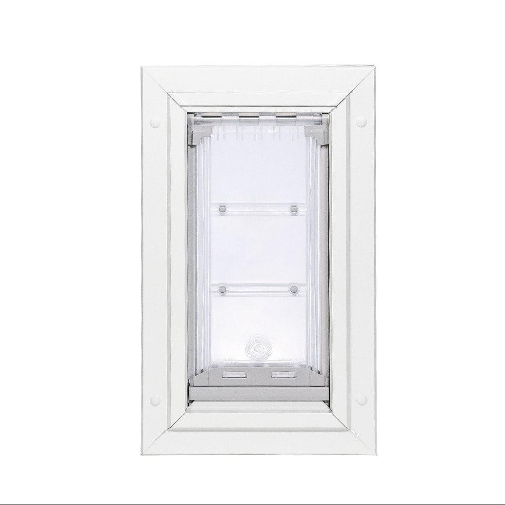 White pet door flap with white frame.