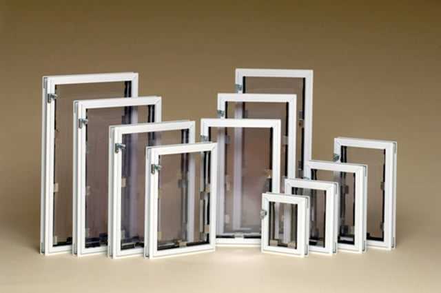 Multiple white-framed window screens in varying sizes are arranged on a neutral background.