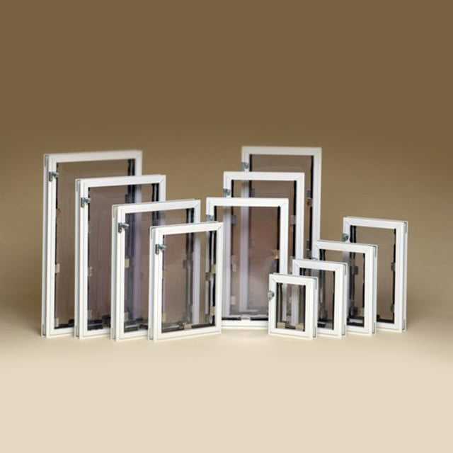 A collection of white-framed window screens of varying sizes.