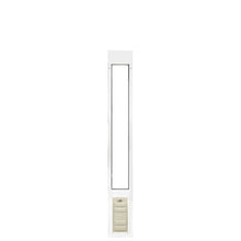 A white, vertical pet door frame.