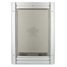 A pet door with an aluminum frame and a transparent flap.