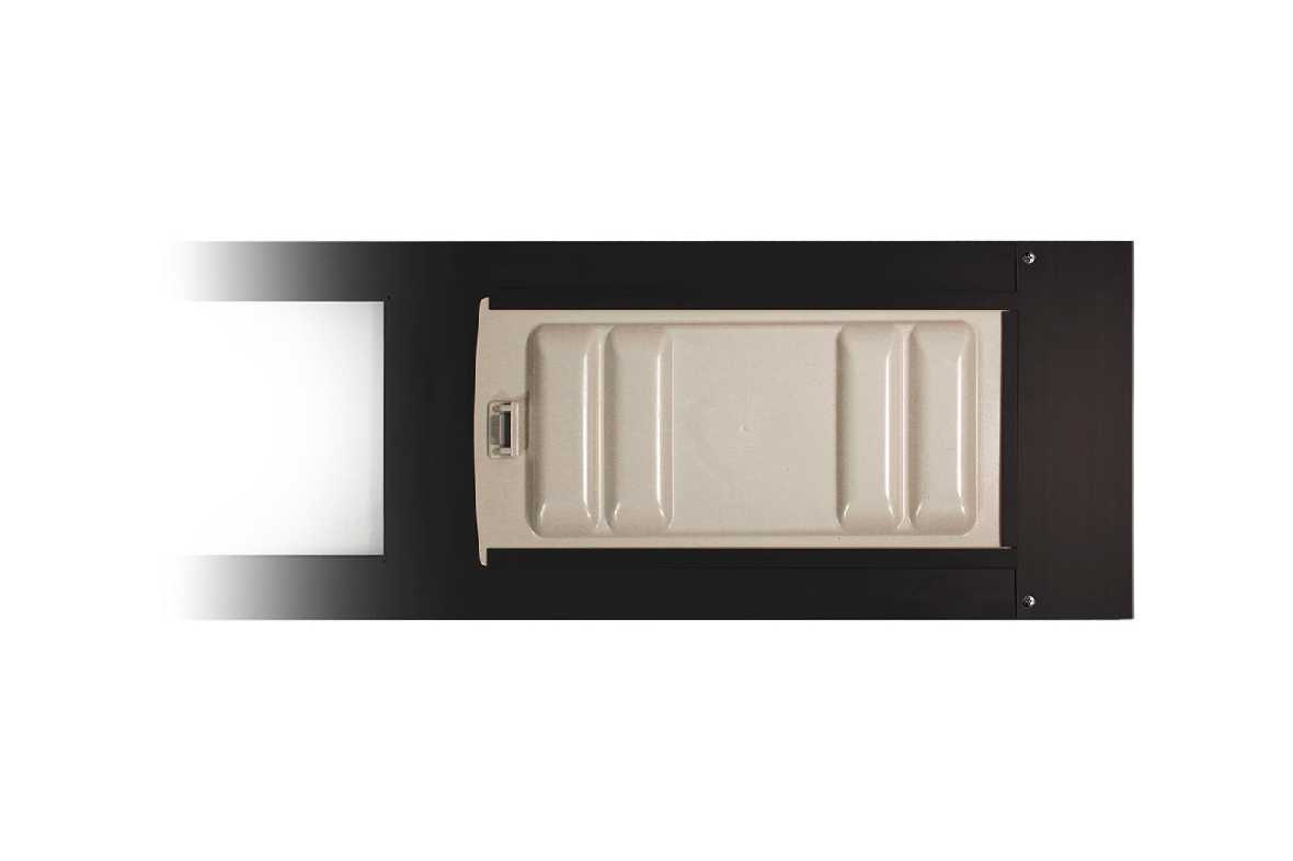 A black frame surrounds a rectangular container with ridges and a handle.