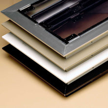 A stack of four picture frame corners, each a different color.