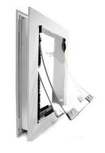 A white pet door with a clear, flexible flap is shown partially open.