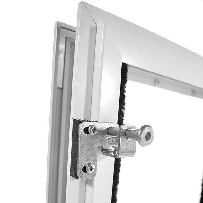 Close-up of a white-framed window with a metal latch.