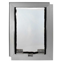 A Hale brand pet door with a silver frame.