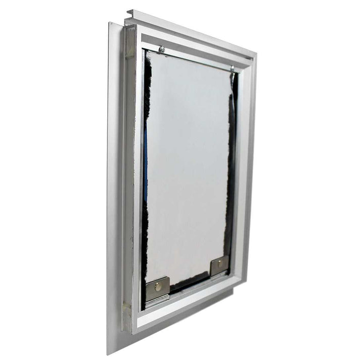 A white rectangular access door is installed in a wall.