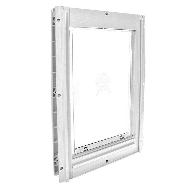 A pet door with a white frame.