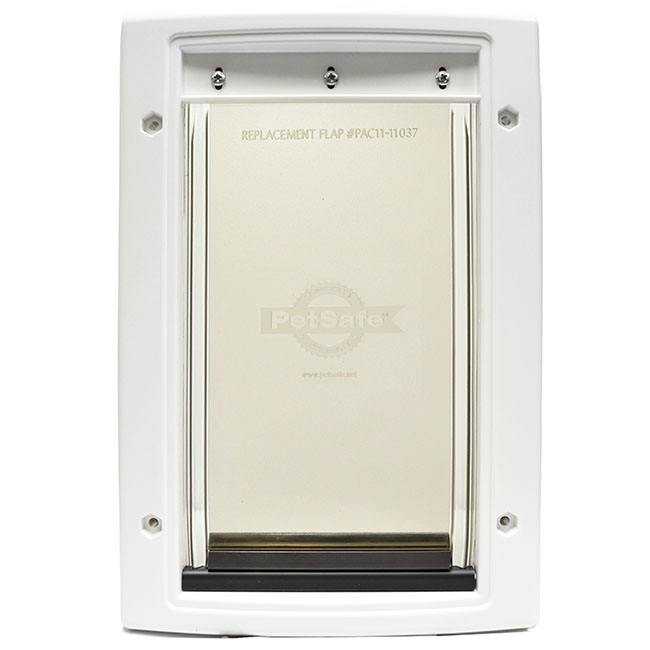 A white PetSafe pet door with a replacement flap.