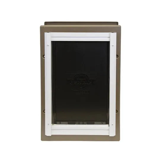 A pet door with a brown frame and black flap.