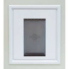 A dog door installed in a wall._Color_White