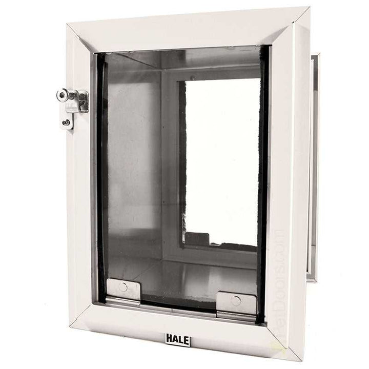 A Hale brand dog door with a white frame.