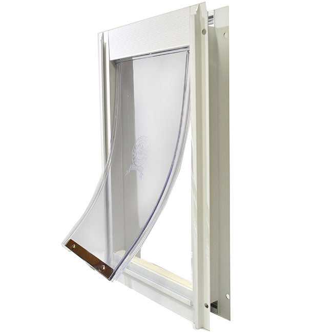 A pet door with a clear flap in a white frame.