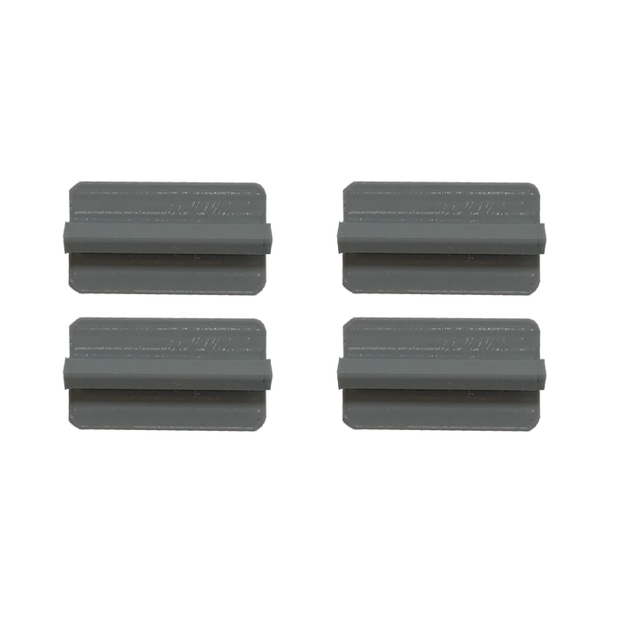 Four gray, rectangular objects with a raised bar in the center on a white background.