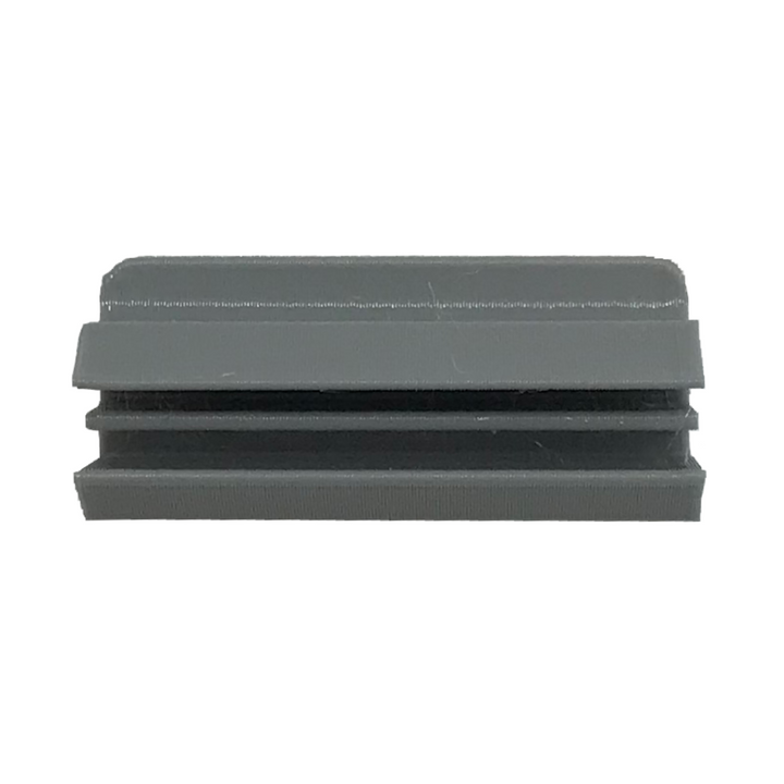 Gray, rectangular plastic end cap.