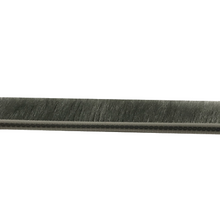 Close-up of gray brush weather stripping.