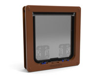 Brown-framed pet door with a translucent flap.