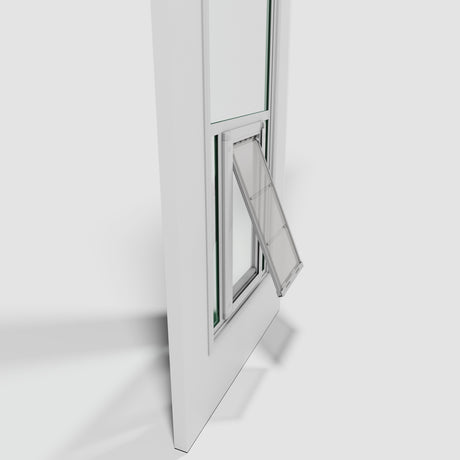 A white window with a small pet door is partially open.