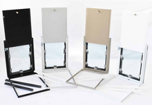 Four pet doors in black, gray, tan, and white are shown with their respective frames and closing panels.
