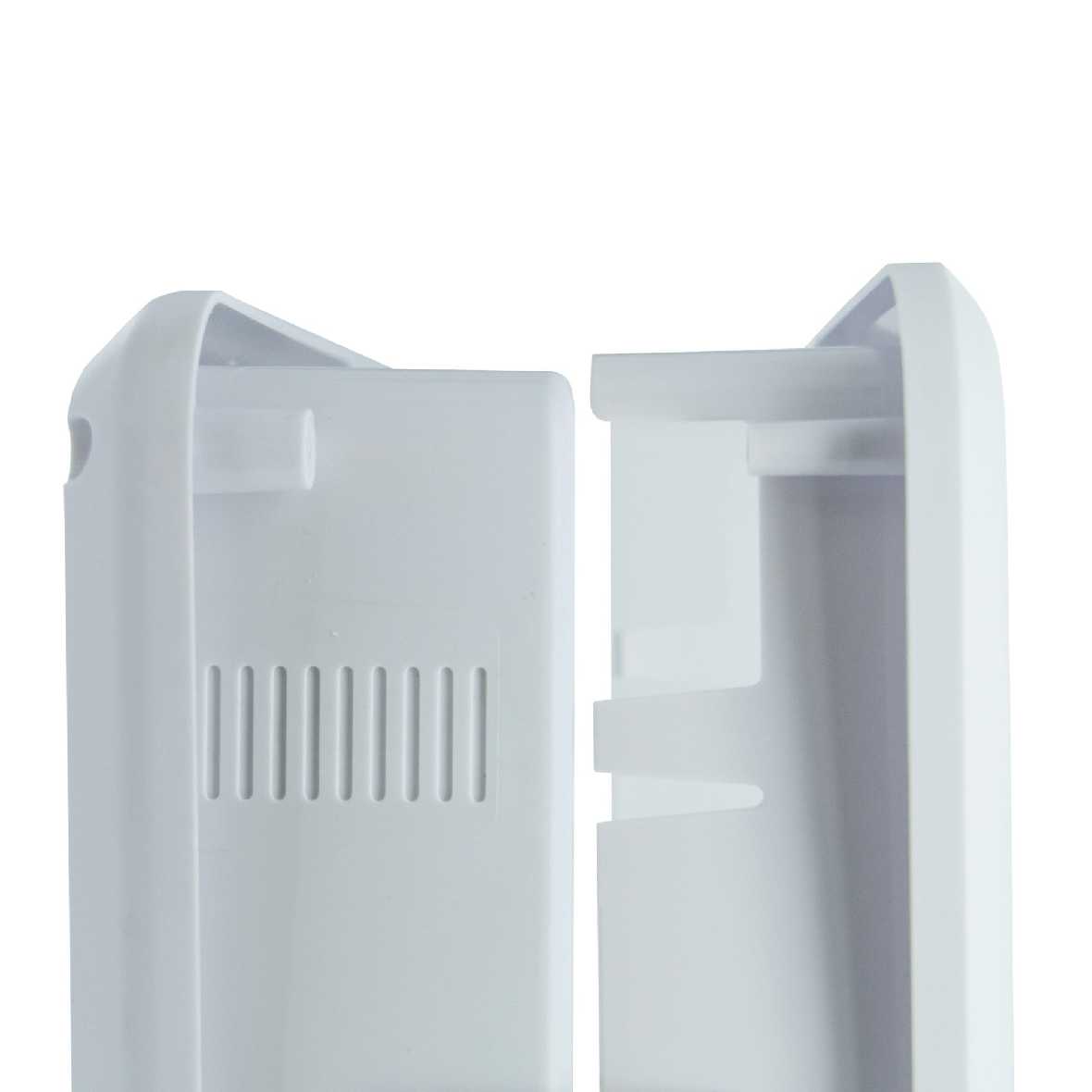 Close-up of two open, white plastic components.