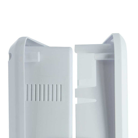 Close-up of two open, white plastic components.