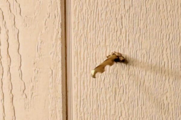 DRILL THROUGH THE OUTER WALL