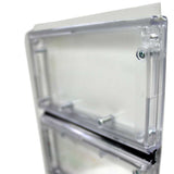 A close-up shows a clear plastic box, likely a protective enclosure, with visible screws.