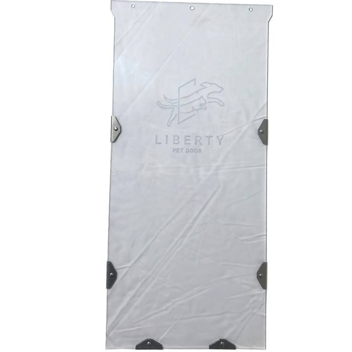 A "Liberty Pet Door" transparent vinyl flap.