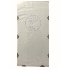 A white pet door replacement flap, featuring the Liberty Pet Door logo, with metal corner reinforcements.