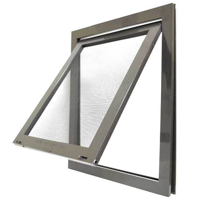 Close-up of a gray framed pet door with the screen swung open.