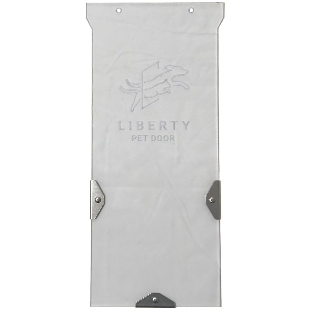 White "Liberty Pet Door" flap with metal brackets.