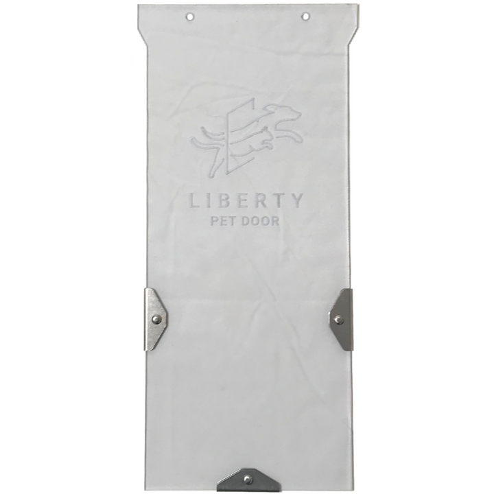 White "Liberty Pet Door" flap with metal brackets.
