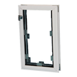 A white window frame has metal brackets attached.