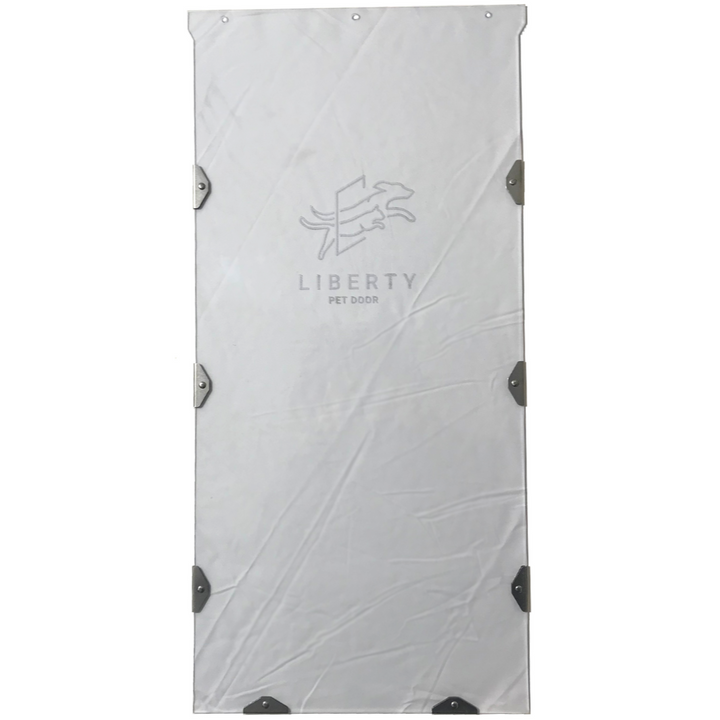 A white Liberty Pet Door replacement flap with metal hardware.