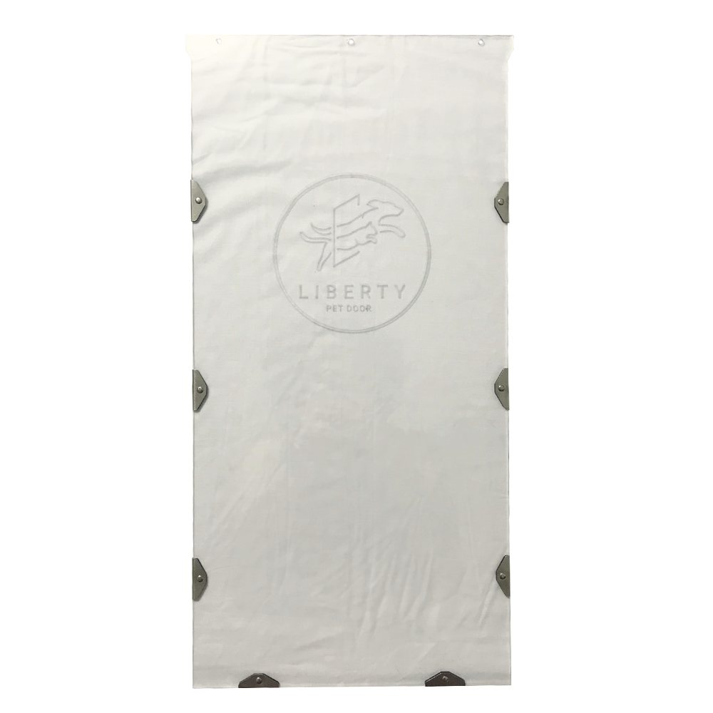White plastic pet door replacement flap with Liberty Pet Door logo.
