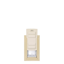 A beige pet door with a white closing panel.