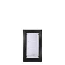 Black-framed pet door with a clear flap.