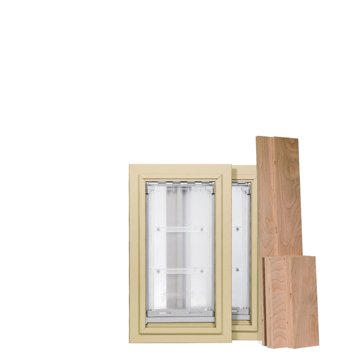 Two tan framed pet doors and wooden panels.