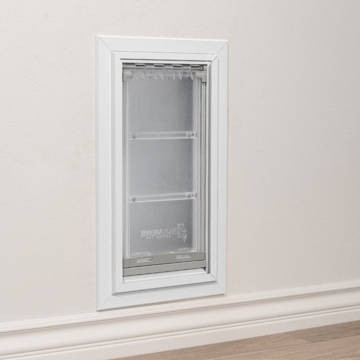 Endura Flap pet door installed in a wall.