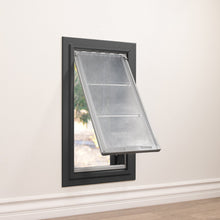 A dog door is installed in a wall.