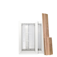 Two white-framed pet doors and wooden shims lean against a white background.