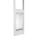 White framed sliding glass door insert with a clear pet door.