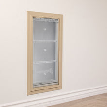 A pet door is installed in a wall.