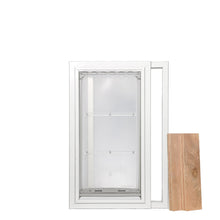 A white framed pet door with a clear flap and wood panel.