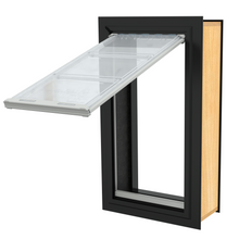 Black-framed pet door with an open, clear flap.